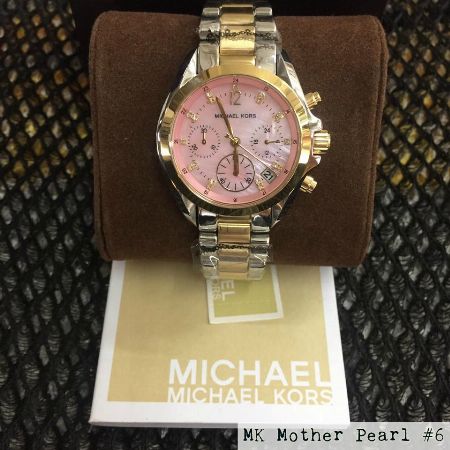 mk mother of pearl watch